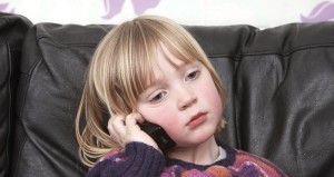 child talking to grandparent on phone