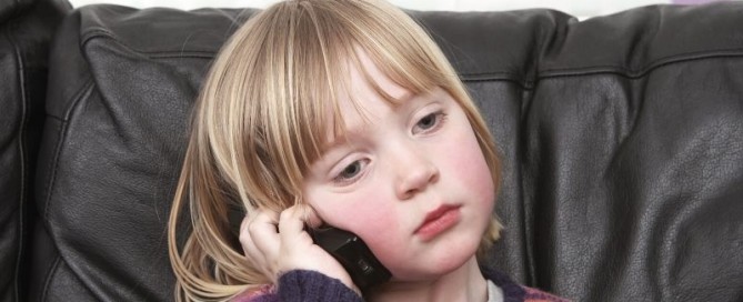 child talking to grandparent on phone